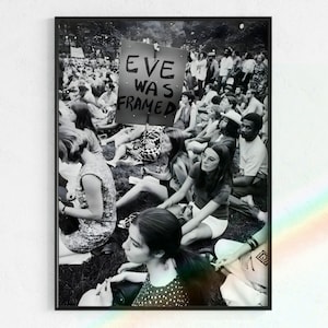 Black and White photograph of feminist protest sit-in, featuring an "Eve Was Framed" protest poster. Available as a direct download from Wilo Art Gallery on Etsy.