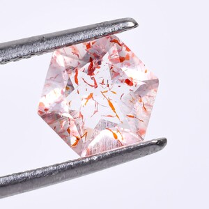 Super Seven-kwarts-edelsteen: zeshoekige lepidocrociet-melodiesteen, 7 x 7 mm