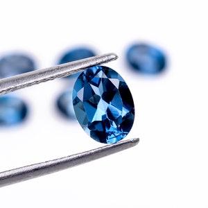 Oval Faceted London Blue Topaz: Loose Gemstone, Calibrated Sizes 5x3 to 10x8 mm