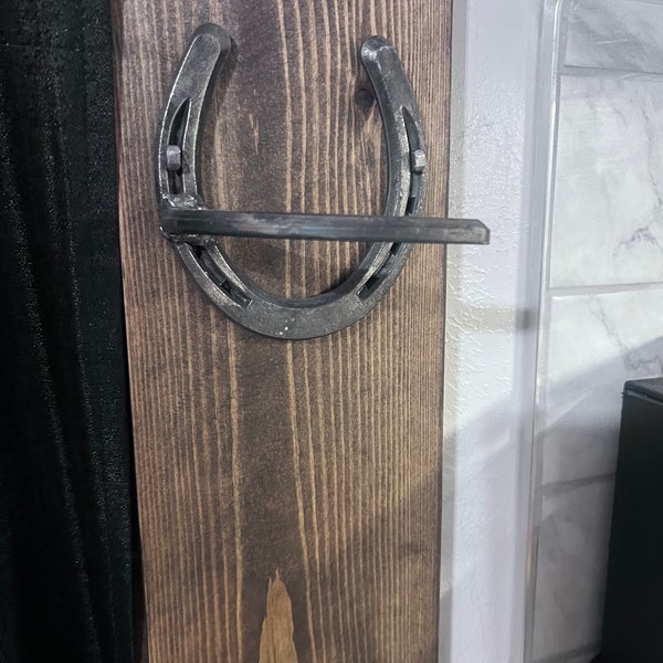 Horseshoe curtain tie back (left)