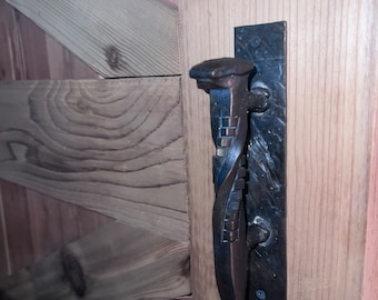 Hand forged railroad spike door handle