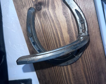 Horseshoe curtain tie back (left)