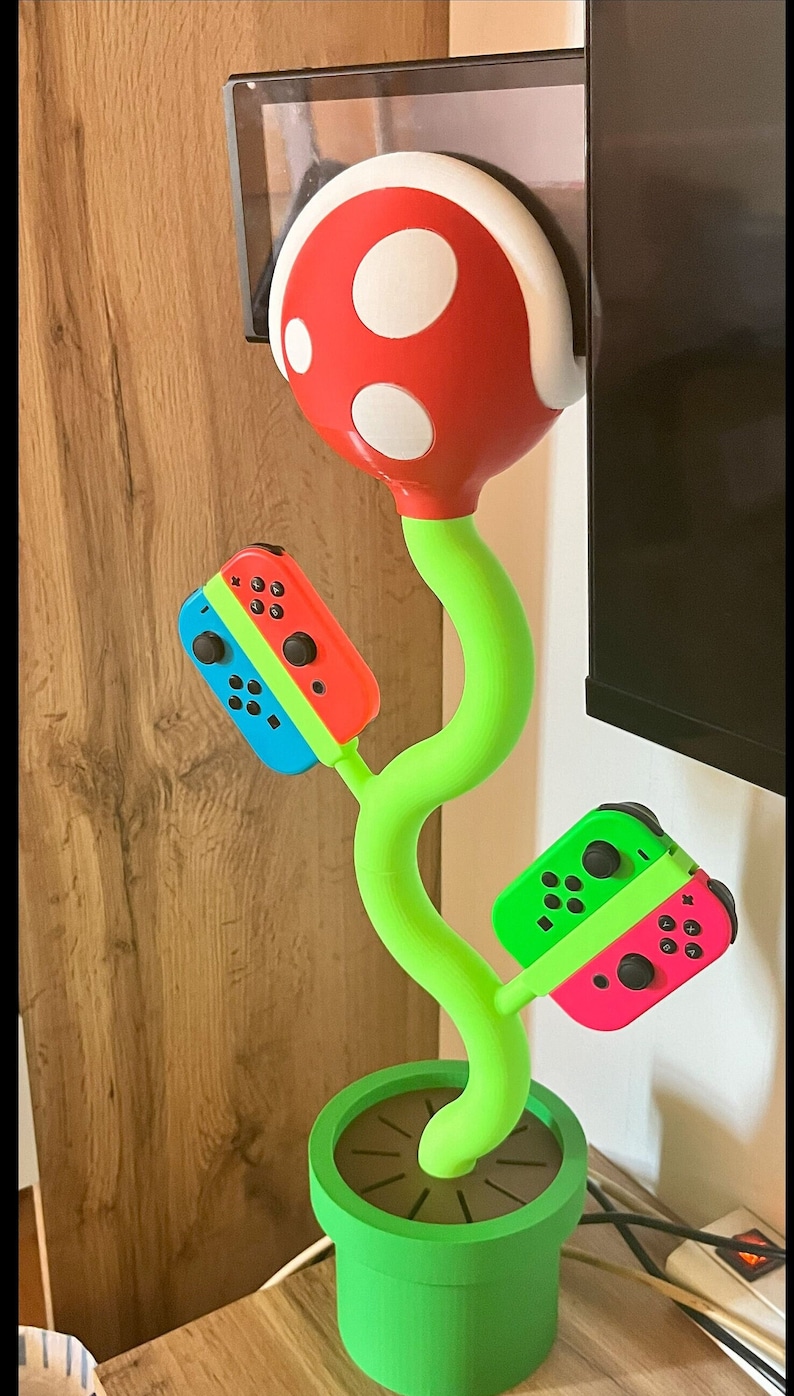 Switch Plant Stand Pflanze mit Ladefunktion TV-Modus möglich Bild 1