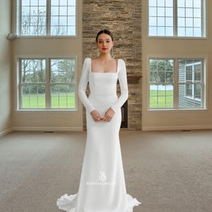 Custom Made White Sheath Wedding Dress: Long Sleeve Backless Reception Gown