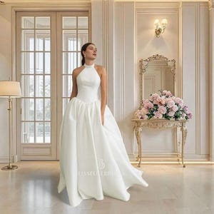 Satin A-Line Wedding Dress: High Neck, Open Back, V Pleated Waist