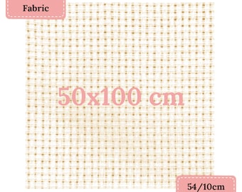 May include: Cream-coloured cross stitch fabric, measuring 50 x 100 cm. The fabric has a grid-like pattern, with a count of 14 stitches per 10 cm. The image includes text that reads "Cross Stitch Fabric". The fabric is approximately 19.7 x 39.4 inches.
