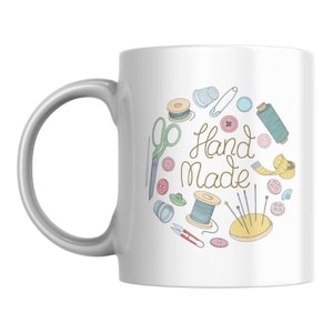 White mug with handicraft design, perfect coffee cup for crafters, ideal gift for handicraft lovers, ceramic cup for creative work breaks