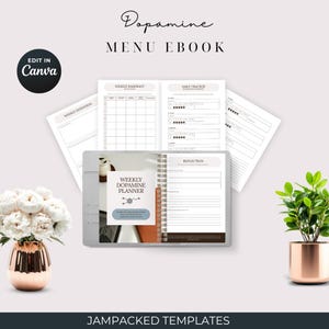 Puede incluir: Un planificador digital titulado "Weekly Dopamine Planner" con encuadernación en espiral, abierto para mostrar las páginas de seguimiento diarias y semanales. La portada tiene una pancarta azul con el texto "Weekly Dopamine Planner". También está el texto "Dopamine Menu Ebook" y "Edit in Canva".