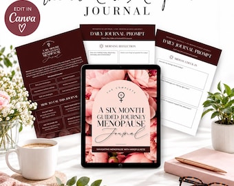 May include: A digital tablet displays a cover for The Complete A Six Month Guided Journey Menopause Journal with a floral background. Printed pages show daily journal prompts, morning reflections, and midday check-ins in dark red and white.