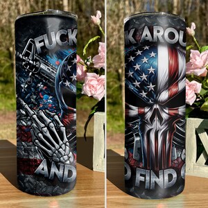 May include: A stainless steel tumbler with a black and red design featuring a skull with an American flag, a gun, and the text "F**k Around And Find Out".