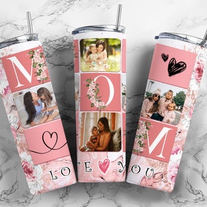 May include: A pink and white stainless steel tumbler with a floral design and photos of a mother and her children. The tumbler has the word "MOM" in large letters and the words "LOVE YOU" at the bottom.