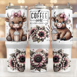 May include: White stainless steel tumbler with a brown and white cow cartoon drinking a milkshake. The tumbler has a pink and white sunflower design and the text "Coffee mode all day every day".