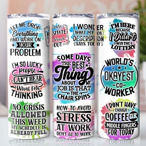 May include: Three stainless steel tumblers with colorful abstract designs and motivational quotes. The quotes include "Let me drop everything and work on your problem", "Some days the best thing about my job is that the chair spins", and "I'm here because I didn't win the lottery".
