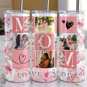 May include: A pink and white stainless steel tumbler with a floral design and photos of a mother and her children. The tumbler has the word "MOM" in large letters and the words "LOVE YOU" at the bottom.