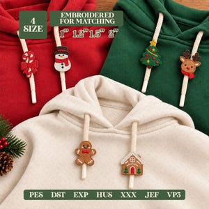 May include: Three hoodies in red, green, and cream with textured fabric. The drawstrings feature embroidered holiday charms including a candy cane, snowman, Christmas tree, reindeer, gingerbread man, and house. Text reads 4 SIZE 1" 1.2" 1.5" 2".