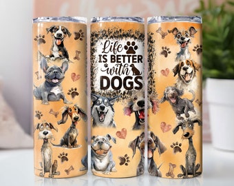 May include: A stainless steel tumbler with a colorful design featuring various dog breeds. The tumbler has a white background with paw prints, bones, and hearts. The text "Life is better with dogs" is printed in black on the tumbler.