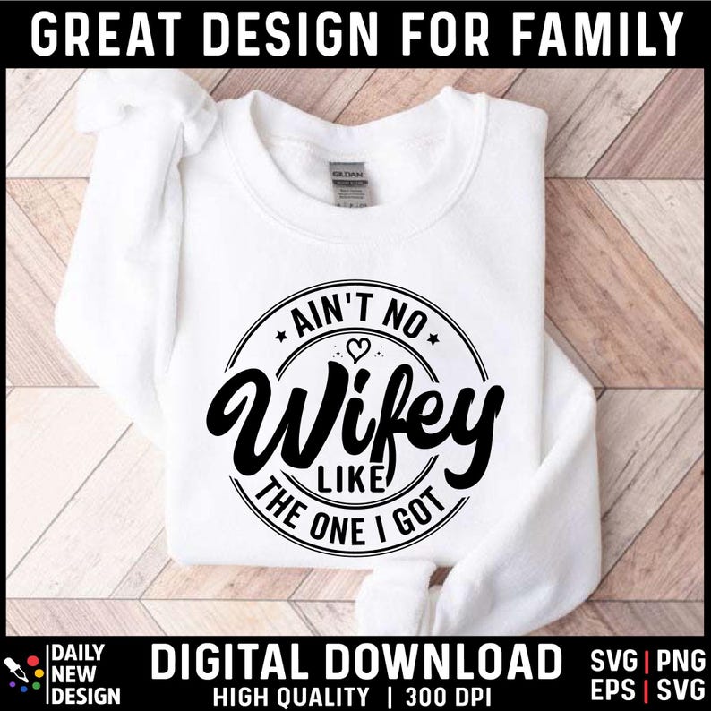 May include: White sweatshirt with a black circle graphic that says "Ain't No Wife Like The One I Got" with a small heart in the center of the circle.