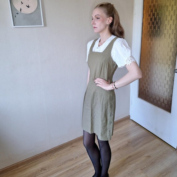 Vintage 1990s linen and cotton preppy pinafore mini dress in khaki green Vintage 1990s linen and cotton preppy pinafore mini dress in khaki green
