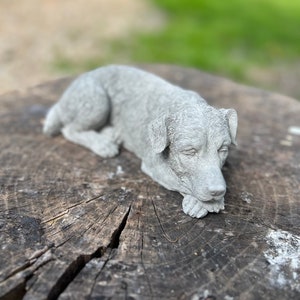 stone/concrete sleeping dog garden ornament statue