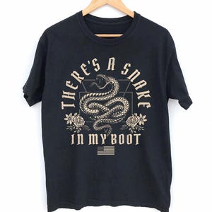There's a snake in my boot shirt, Funny snake animal, Snake lover, Snake Pun, I love snakes, Snake memes shirt, Mythical snake crewneck tee