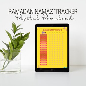 Può includere: Un tracker digitale stampabile per il Namaz di Ramadan. Il tracker è giallo con un design colorato e include uno spazio per segnare ogni giorno del Ramadan. Il tracker è sullo schermo di un tablet.