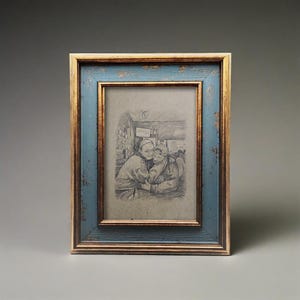 May include: A rectangular picture frame with a distressed blue and gold finish. The frame holds a pencil sketch of two people embracing. The frame is approximately 8 inches tall and 6 inches wide.