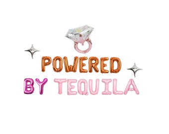 May include: A set of pink, orange and purple foil balloons spelling out "Powered by Tequila" with a silver diamond ring balloon and two silver star balloons.
