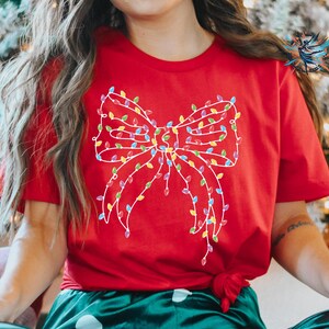 Christmas Lights Coquette Bow Shirt, Women&#39;s Christmas Shirt, Retro Holiday Shirt, Merry christmas Shirt, Bright Christmas crewneck