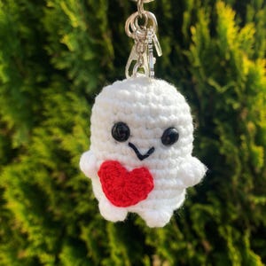 Llavero de Adipose de Doctor Who, tejido a mano con ganchillo y que brilla en la oscuridad.