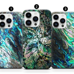 May include: Three iPhone cases with different iridescent patterns. The cases are all black and feature a blue, green, and purple iridescent pattern. The first case has a swirling pattern, the second case has a more abstract pattern, and the third case has a more geometric pattern.