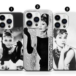 May include: Three black and white iPhone cases with different images of Audrey Hepburn. The first case features a close-up of Audrey Hepburn's face. The second case features a full-body image of Audrey Hepburn. The third case features a close-up of Audrey Hepburn's face.