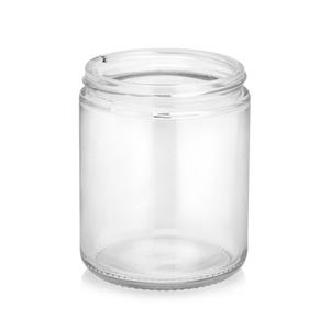 Op de afbeelding: Een glazen pot met een brede opening. De pot is leeg en heeft een gladde, ronde bodem.