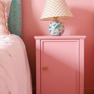 A pair of Daisies - 2 Bedside Tables (with Oak veneer lined cupboard and scallop door)