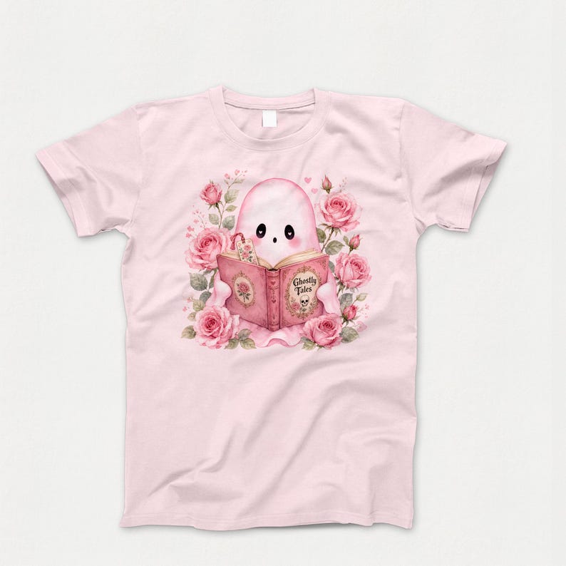 Pink ghost reading book sublimation design on t-shirt. Cute coquette Halloween ghost with flowers, bookish spooky season graphic.