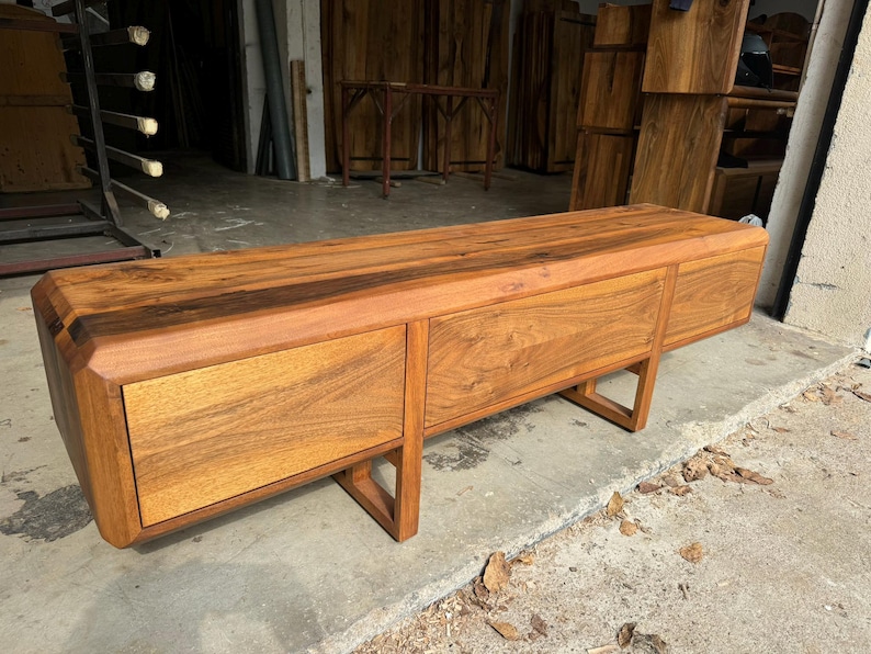 Solid walnut furniture top view showing warm brown color tone