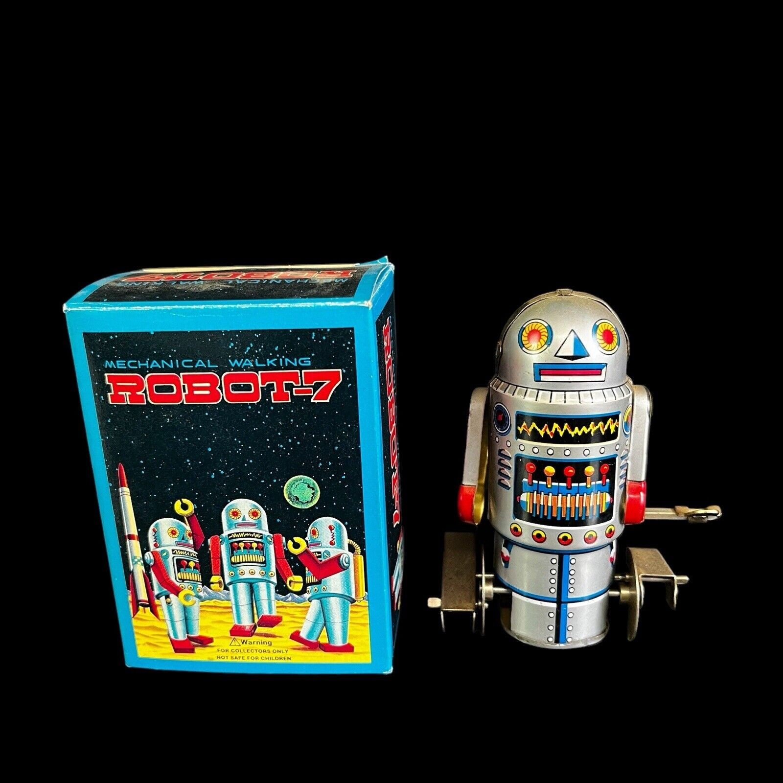 Vintage 70's Robot-7 Tin Mechanical Wind-up Walking Toy Vintage 70's Robot-7 Tin Mechanical Wind-up Walking Toy