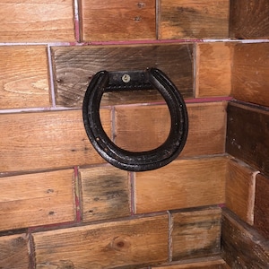 Handmade horseshoe towel holder