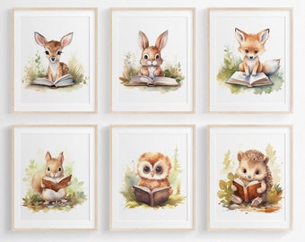 May include: Six watercolor illustrations of woodland animals reading books. The animals are a deer, a rabbit, a fox, a squirrel, an owl, and a hedgehog. Each animal is sitting on a bed of green leaves and holding a book open.
