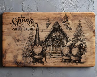 May include: Wooden cutting board with a detailed engraved design. The design features three gnomes, a cottage, and the words "Gnome Sweet Gnome". The board is rectangular with rounded corners and a natural wood grain finish.