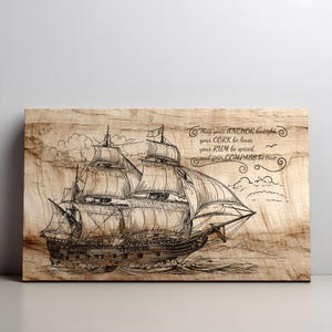 May include: A wooden wall art piece featuring a detailed black and white illustration of a tall ship sailing on the sea. The artwork includes the text "May your ANCHOR be tight, your CORK be loose, your RUM be spiced, and your COMPASS be true."