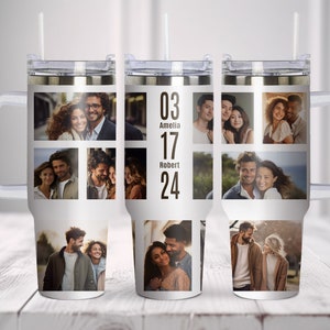 May include: White stainless steel tumbler with a clear lid and handle. The tumbler features a collage of photos of couples on the front. The text "03 Amelia 17 Robert 24" is printed on the tumbler.