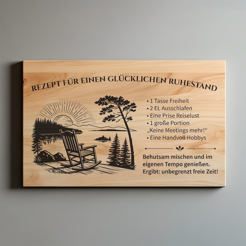 May include: A rectangular light-colored wooden plaque featuring a black engraved illustration of a rocking chair on a dock overlooking a lake at sunrise. The text reads: REZEPT F&Uuml;R EINEN GL&Uuml;CKLICHEN RUHESTAND, followed by a list of ingredients and instructions.