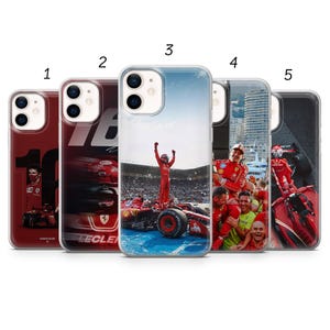 May include: Five phone cases with Formula 1 imagery. The cases showcase race cars, drivers, and victory celebrations. The colour palette includes red, black, and white.