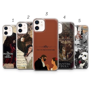 May include: Five phone cases featuring designs inspired by "The Phantom of the Opera." The cases display images of characters, musical notes, and the text "The Phantom of the Opera" and "Past the Point of No Return."