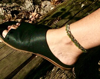 Anklet earth tones using brick stitch Miyuki delica seed beads. Forest green, iridescent topaz, beige, ivory mix with big lobster claw clasp