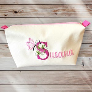 Trousse de toilette synthétique brodée