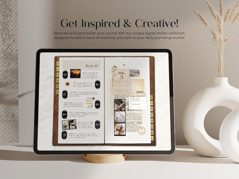 May include: A digital planner displayed on a computer screen with a brown cork background. The planner features a weekly spread with dates and numbers, and a monthly calendar showing May 5th. The planner is decorated with digital stickers, including a sunset, a sunflower, and a book.