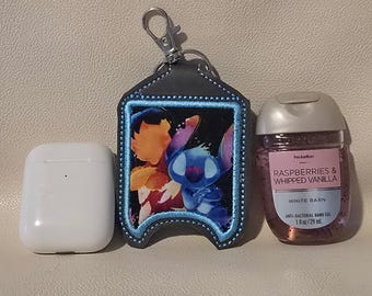 Blue alien sanitizer/airpod holder
