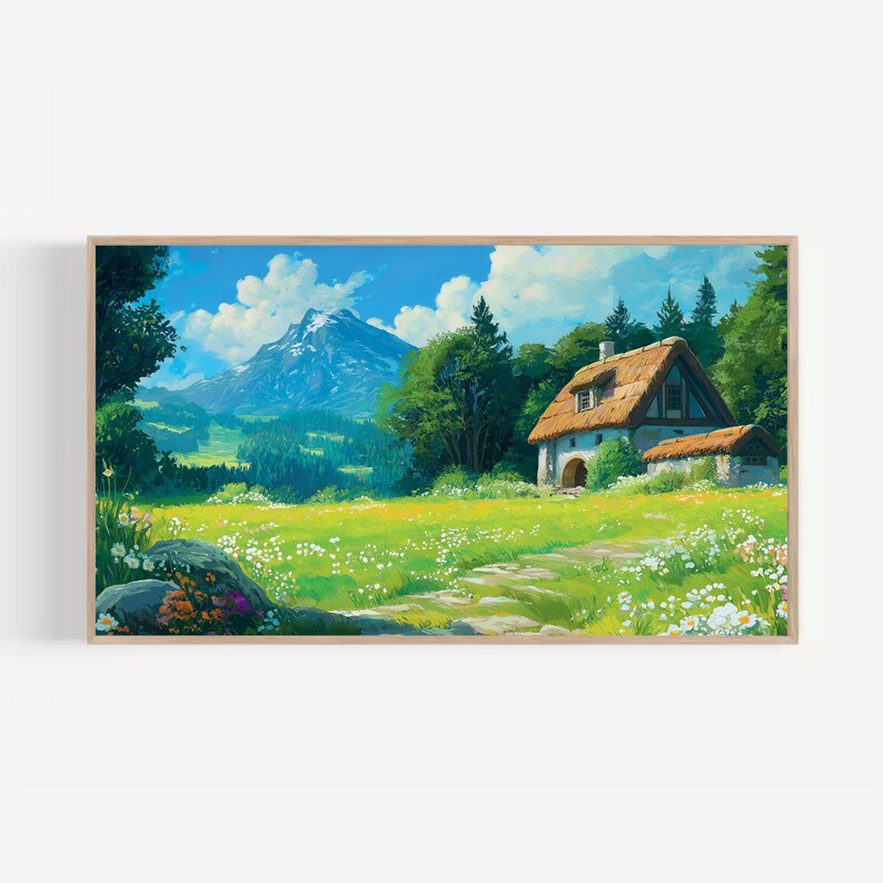 May include: A framed landscape painting depicts a quaint cottage with a thatched roof nestled in a vibrant green meadow. A mountain range rises in the background under a bright blue sky with fluffy white clouds. The scene is filled with lush greenery and wildflowers.