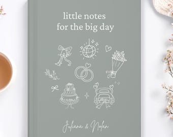 May include: A barely blue wedding notebook with the text "little notes for the big day" and wedding-themed illustrations. The notebook features a cake, rings, and a car. The names "Juliana & Nolan" are written below the illustrations.